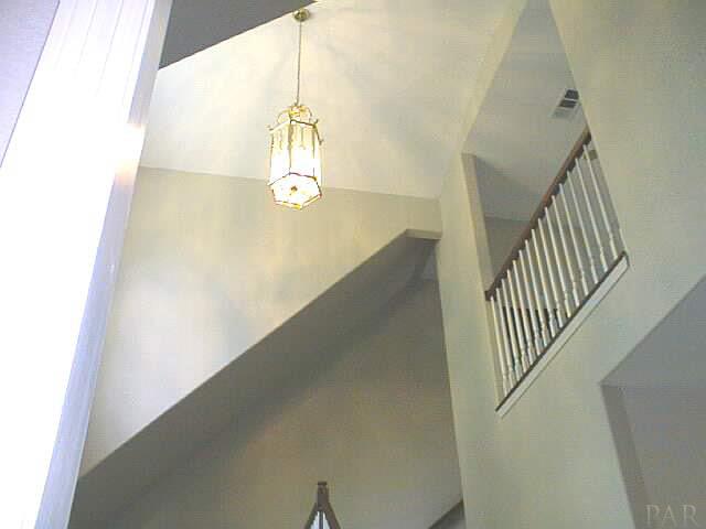 5965 Clark Road Milton, FL 32570 - Photo 2 of 16 a view of a hallway view and hall with wooden floor