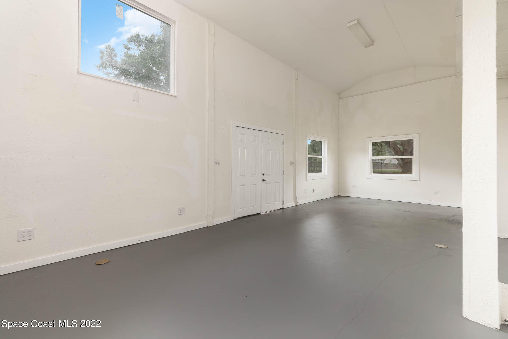 2380 Friday Road Cocoa, FL 32926 - Photo 25 of 30 an empty room with windows