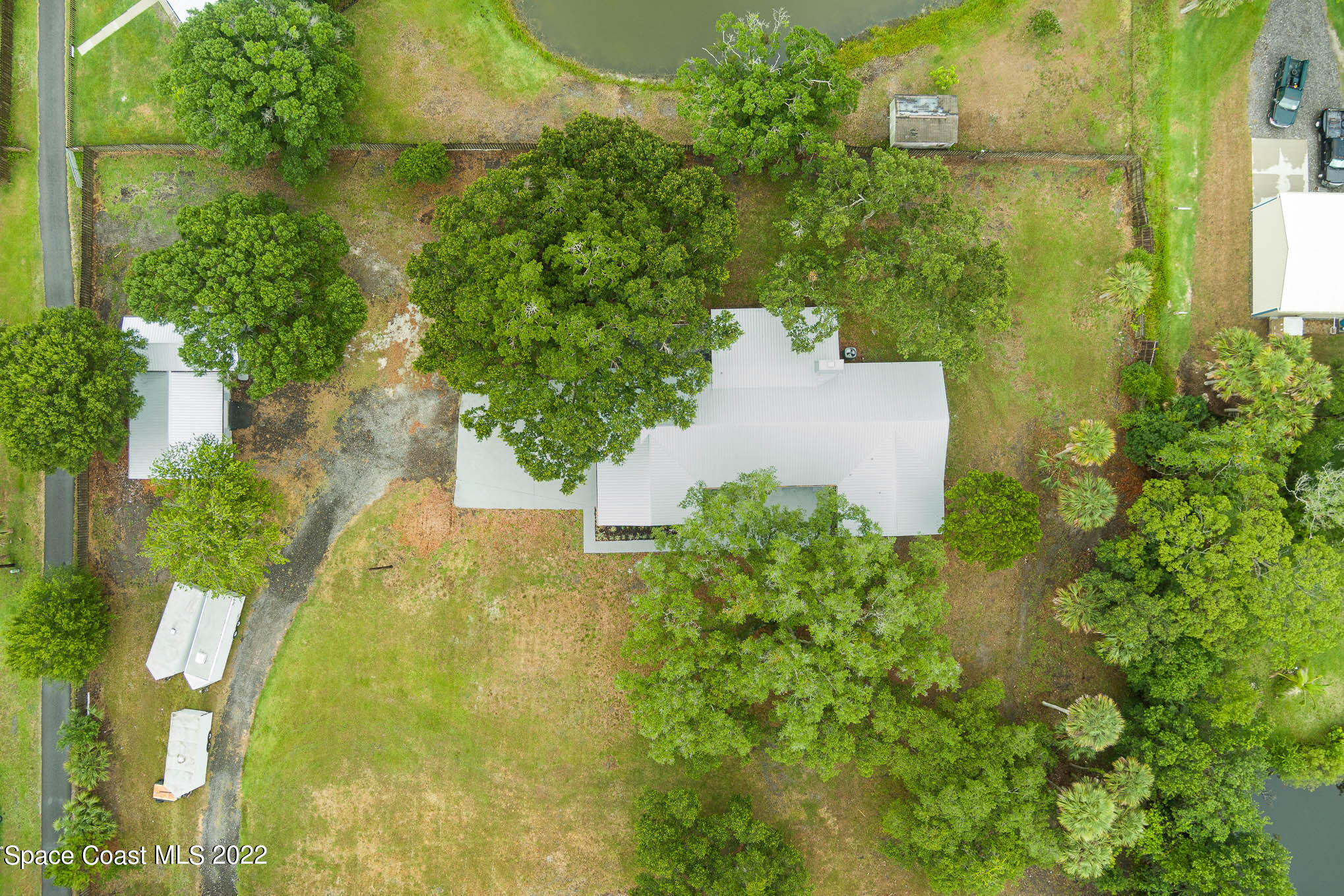 2380 Friday Road Cocoa, FL 32926 - Photo 27 of 30 an aerial view of residential house with swimming pool