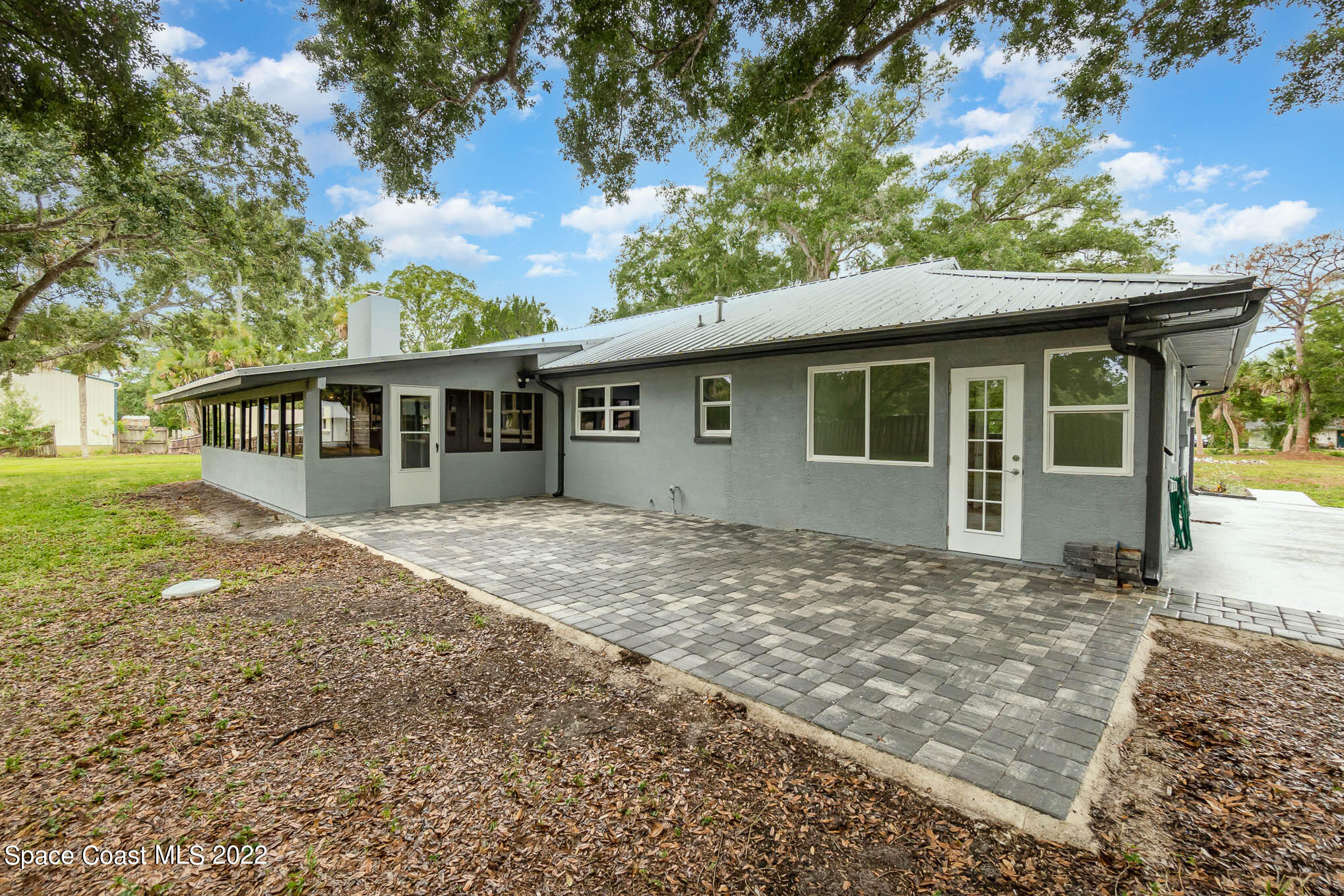 2380 Friday Road Cocoa, FL 32926 - Photo 3 of 30 a view of a house with a yard