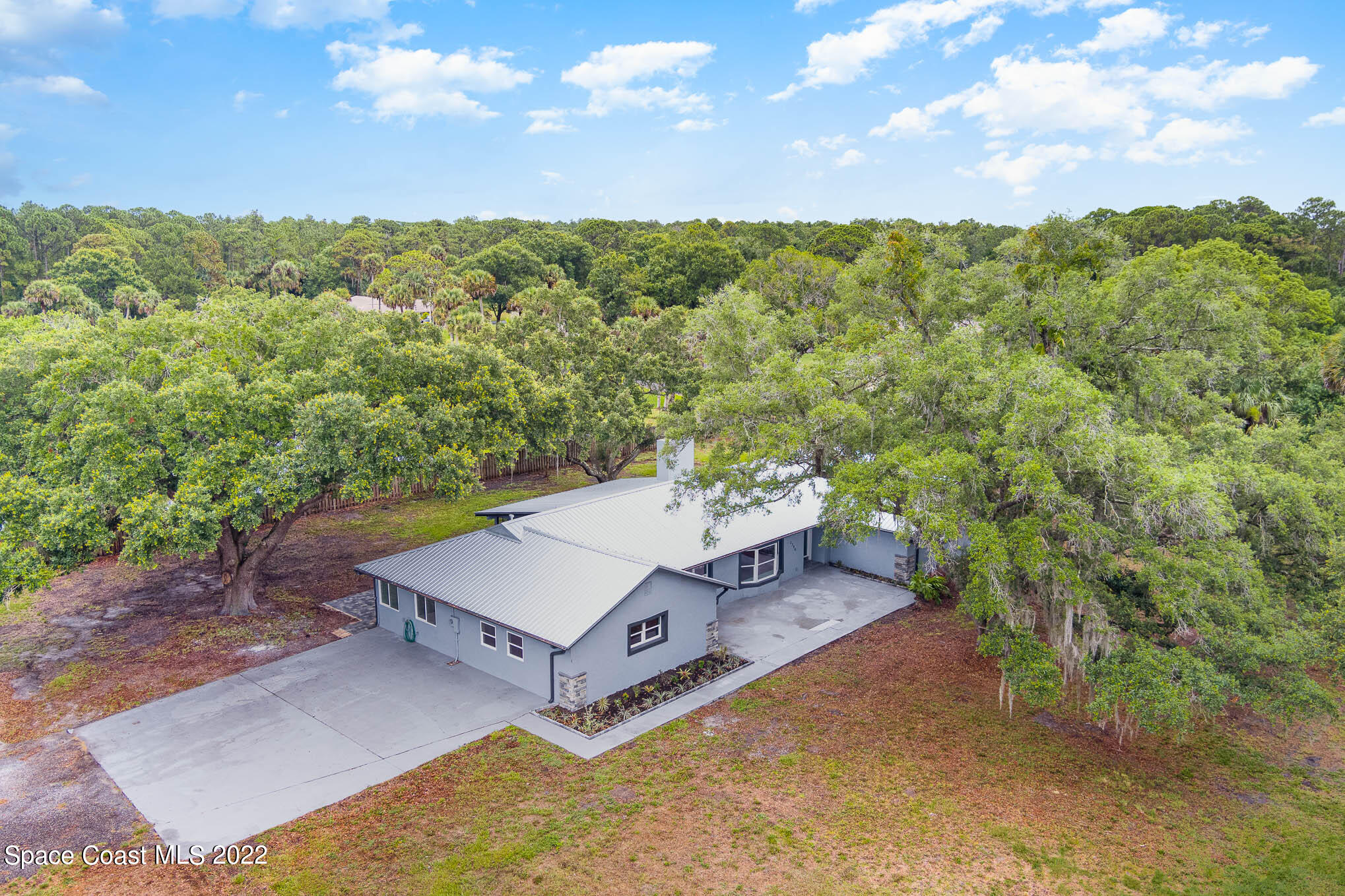 2380 Friday Road Cocoa, FL 32926 - Photo 5 of 30 an aerial view of a house with a yard