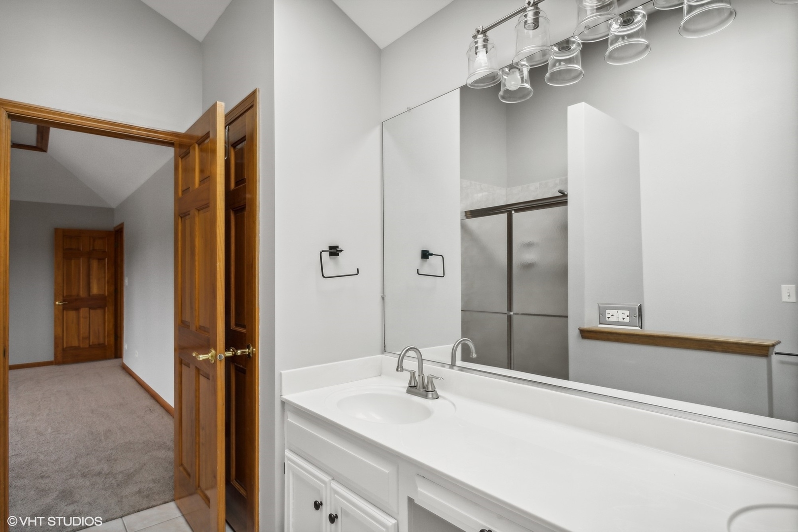 2772 Freeland Circle Naperville, IL 60564 - Photo 16 of 33 a bathroom with a sink vanity and a mirror