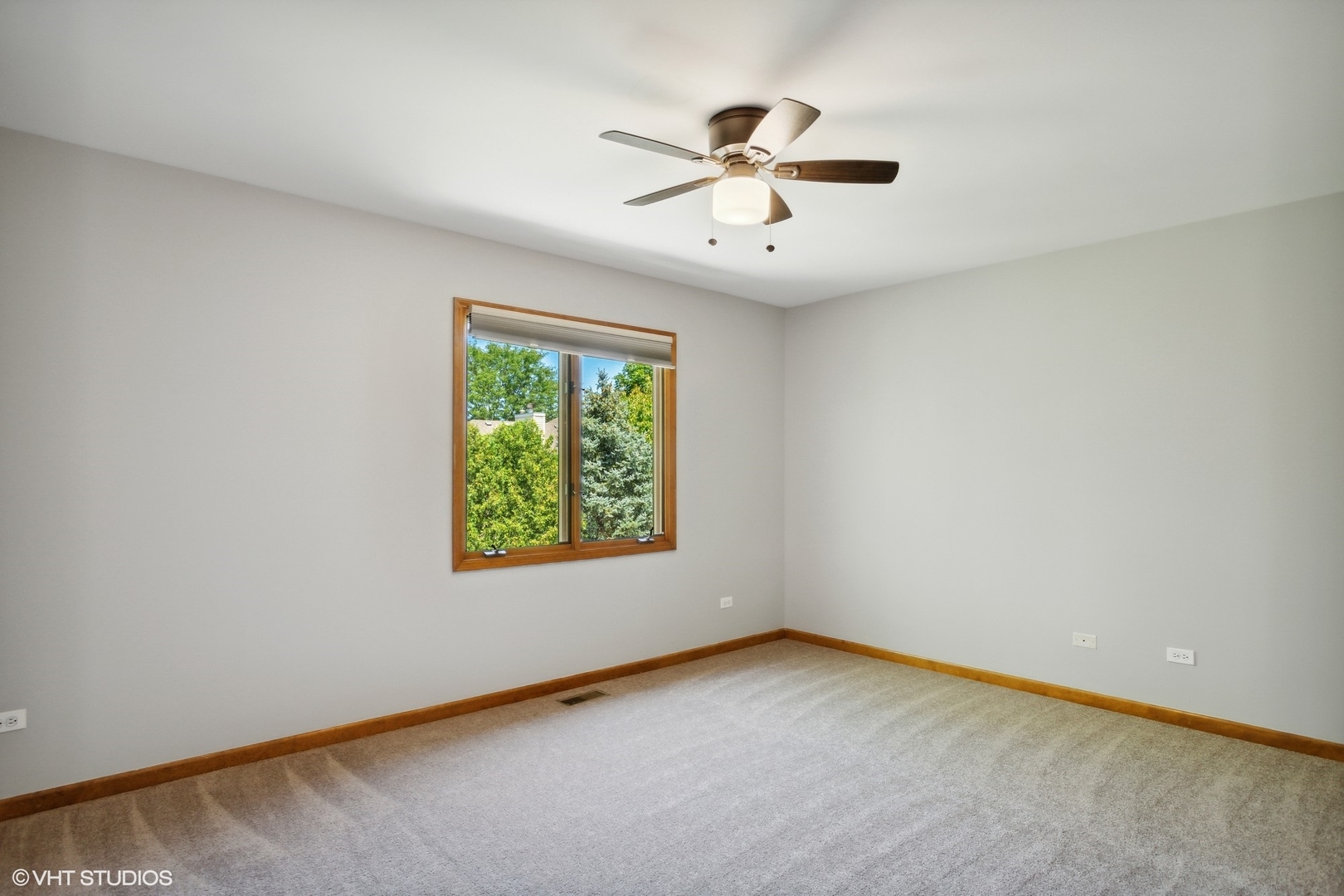 2772 Freeland Circle Naperville, IL 60564 - Photo 17 of 33 an empty room with windows and fan