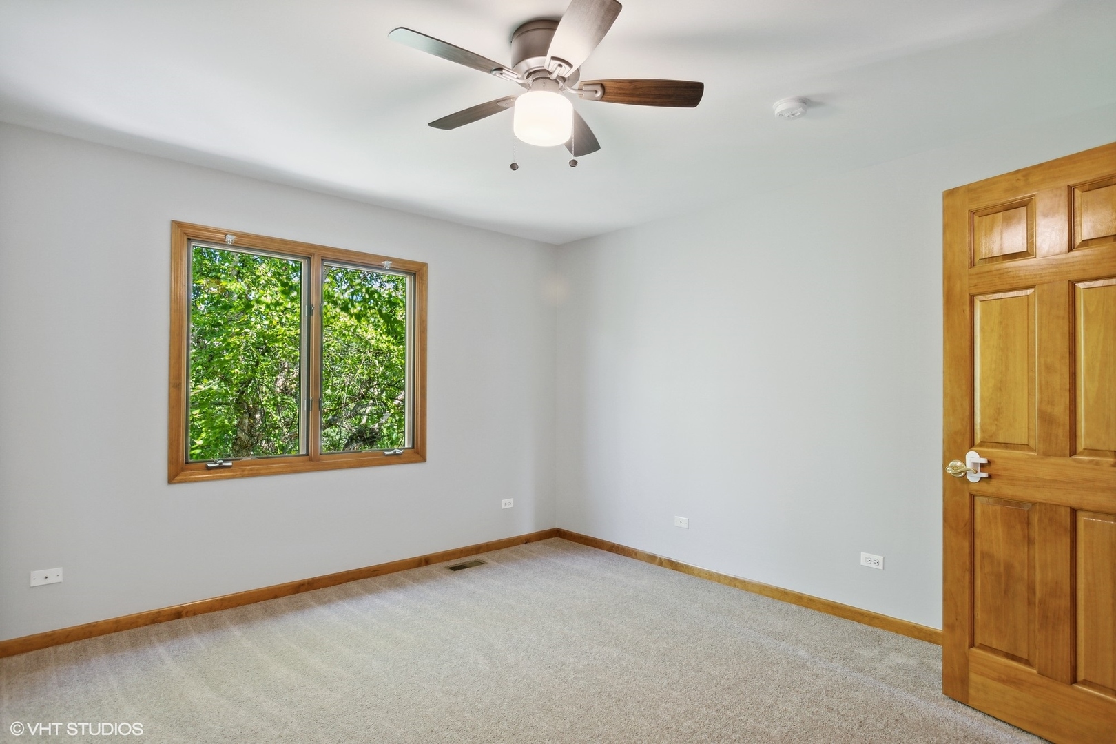 2772 Freeland Circle Naperville, IL 60564 - Photo 18 of 33 an empty room with windows and fan