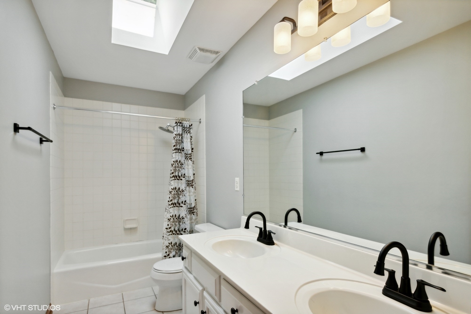 2772 Freeland Circle Naperville, IL 60564 - Photo 21 of 33 a bathroom with a sink a toilet and shower