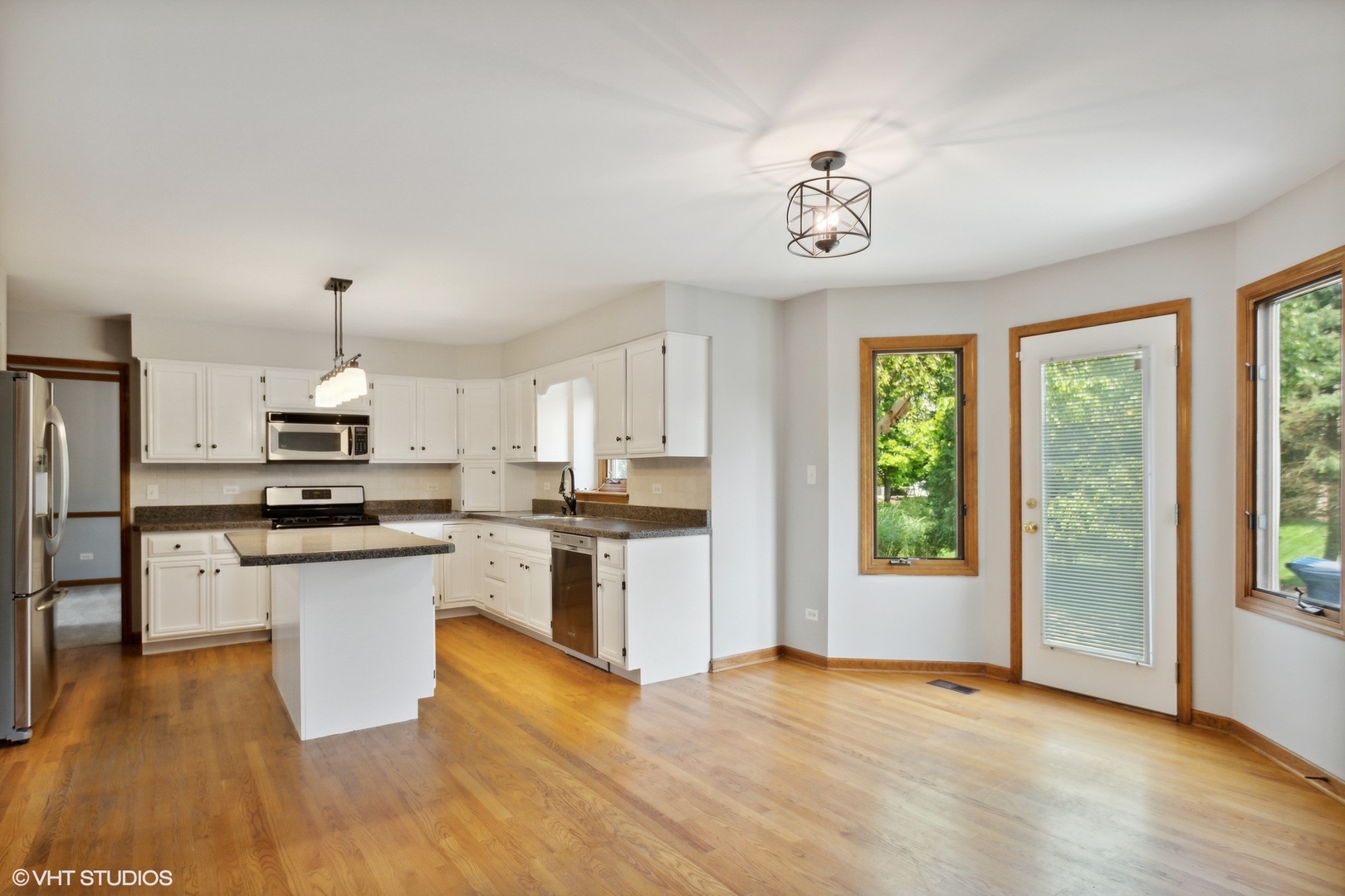 2772 Freeland Circle Naperville, IL 60564 - Photo 8 of 33 a kitchen with a stove a refrigerator and a stove