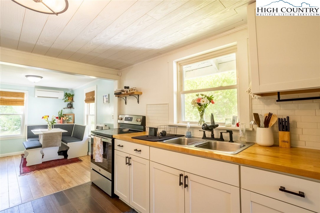 165 V L Moretz Road Deep Gap, NC 28618 - Photo 20 of 38 a kitchen with sink and large window