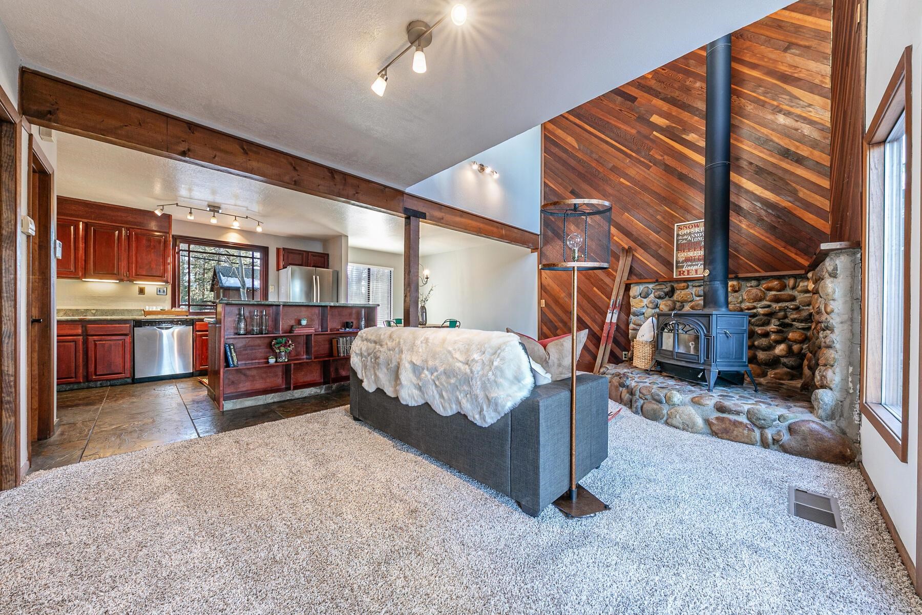 10806 Manchester Drive Truckee, CA 96161 - Photo 12 of 28 a bedroom with furniture and large window