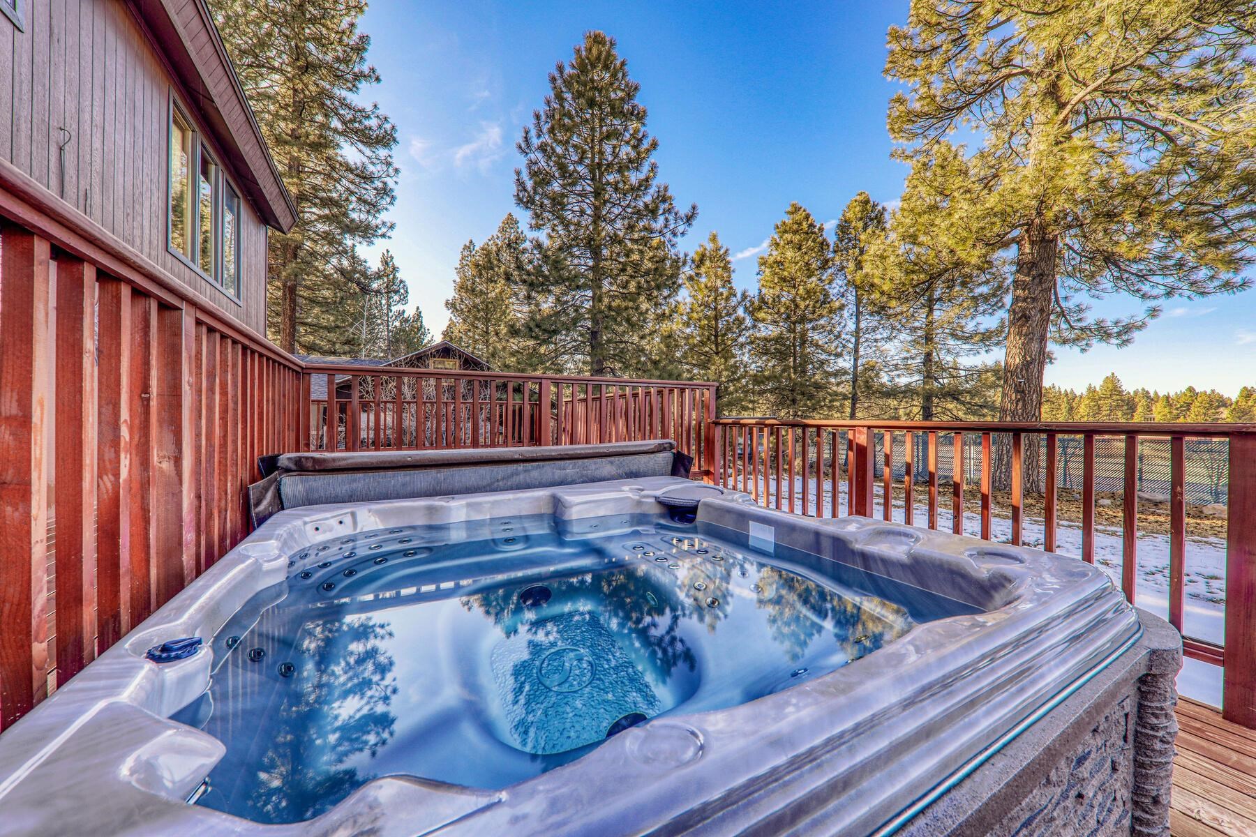 10806 Manchester Drive Truckee, CA 96161 - Photo 15 of 28 a view of a roof deck with wooden fence and floor