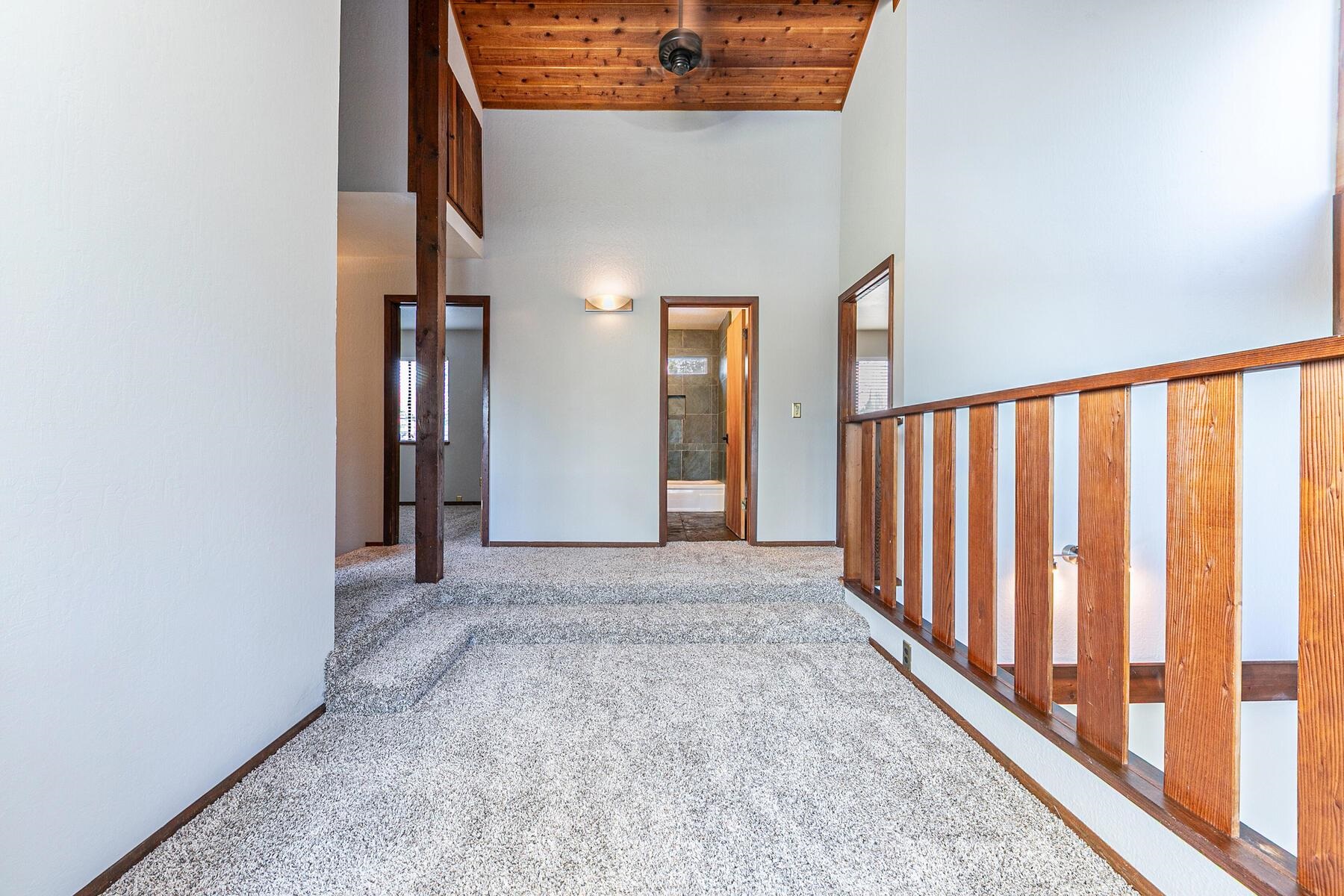 10806 Manchester Drive Truckee, CA 96161 - Photo 19 of 28 a view of a hallway with wooden floor