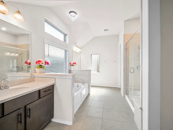 a kitchen with a sink and refrigerator