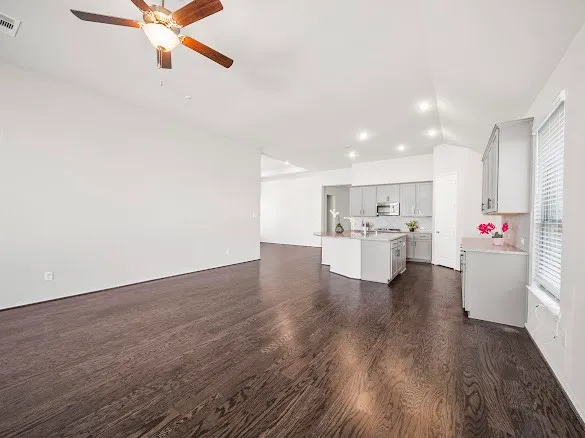 a view of kitchen and wooden floor