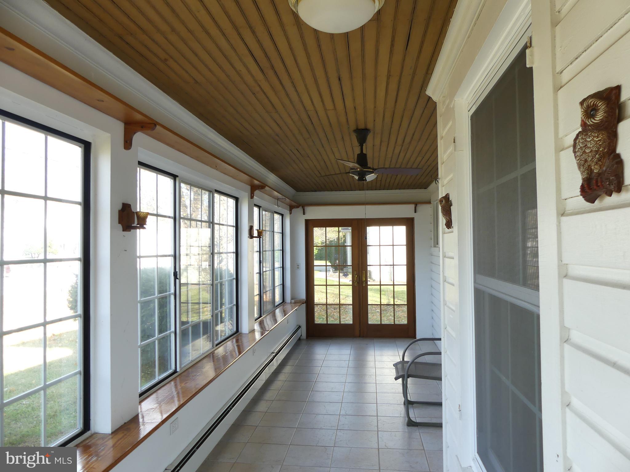 40 Old Hanover Road Reisterstown, MD 21136 - Photo 31 of 37 Glassed in front porch
