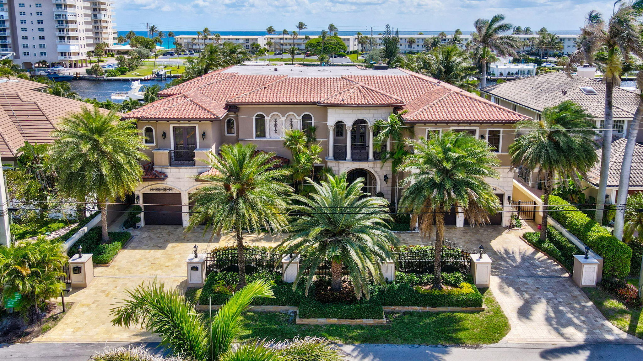 3870 Northeast 31st Avenue Lighthouse Point, FL 33064 - Photo 2 of 151 a view of house with swimming pool and outdoor seating