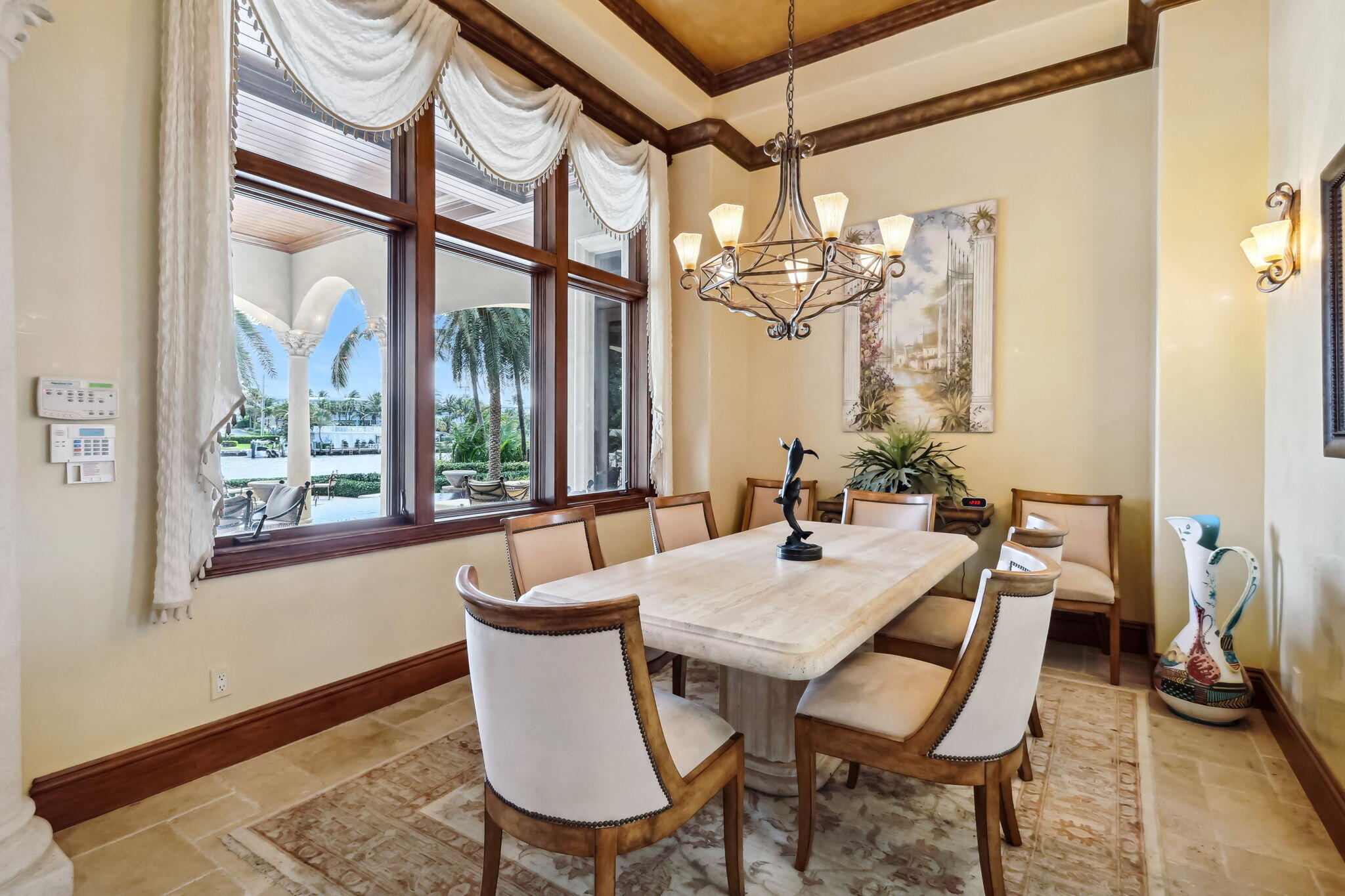 3870 Northeast 31st Avenue Lighthouse Point, FL 33064 - Photo 38 of 151 a view of a dining room and livingroom with furniture wooden floor a chandelier