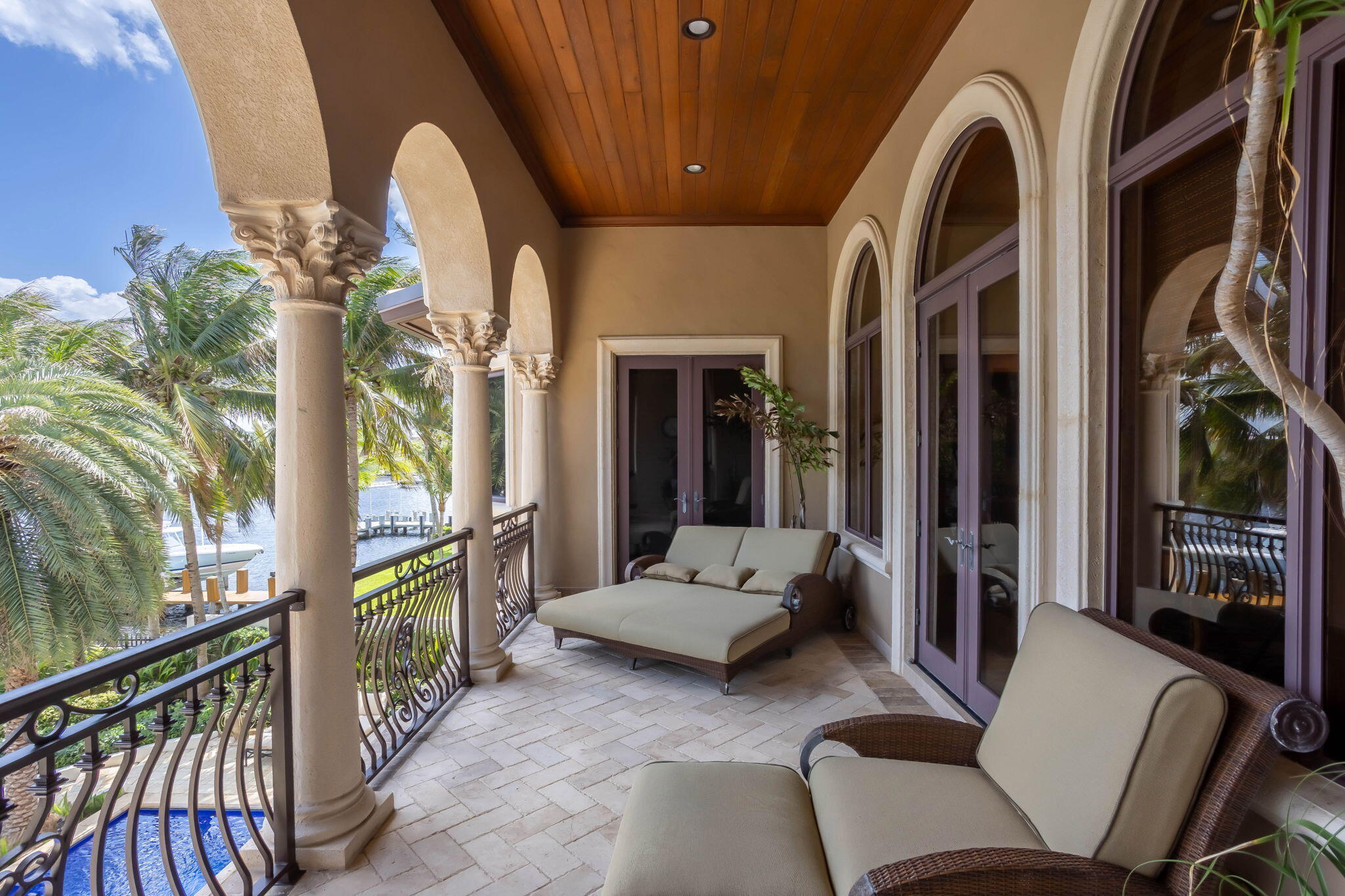 3870 Northeast 31st Avenue Lighthouse Point, FL 33064 - Photo 68 of 151 a living room with furniture and a floor to ceiling window