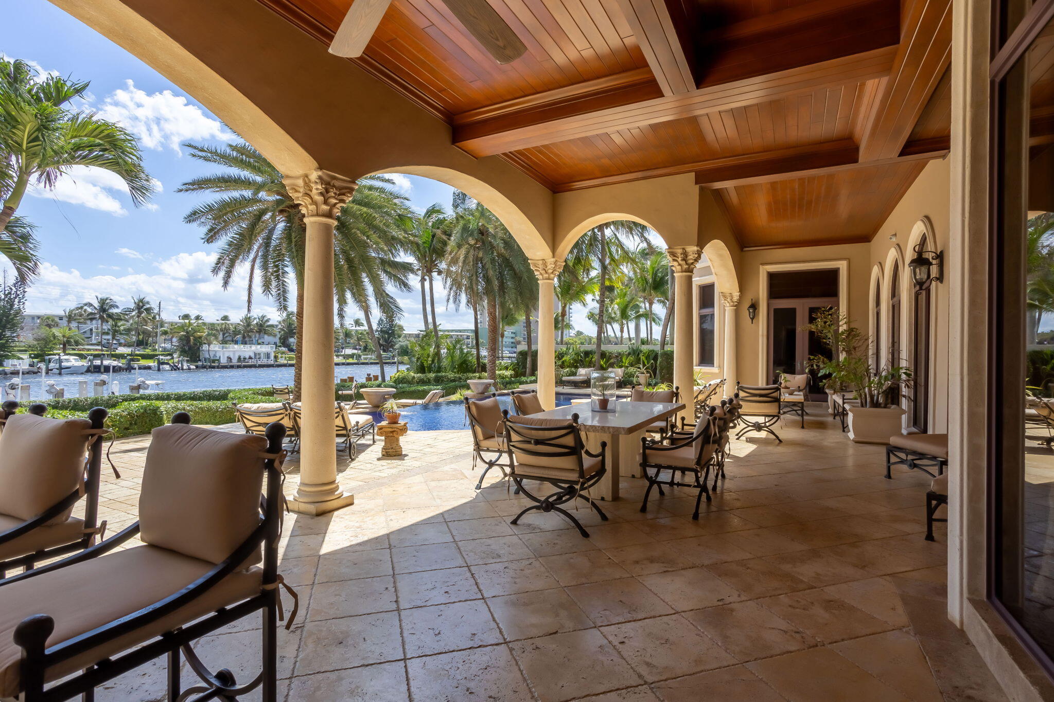 3870 Northeast 31st Avenue Lighthouse Point, FL 33064 - Photo 99 of 151 a view of a swimming pool with outdoor seating and a tub