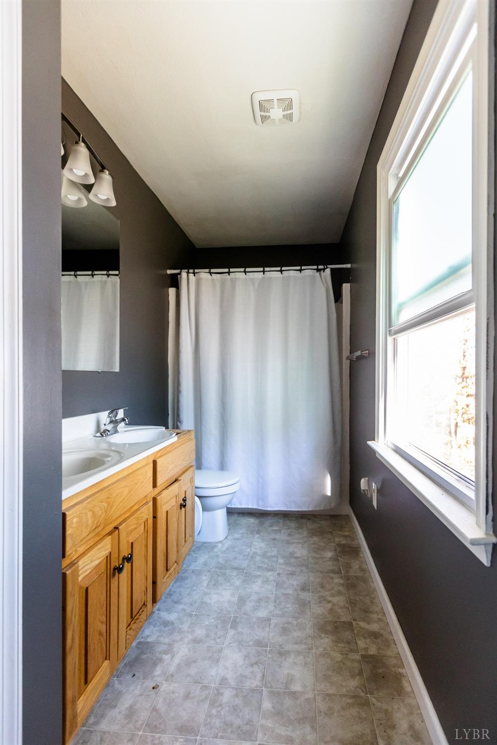 4945 Hixburg Road Pamplin, VA 23958 - Photo 12 of 27 a view of an empty room with a window