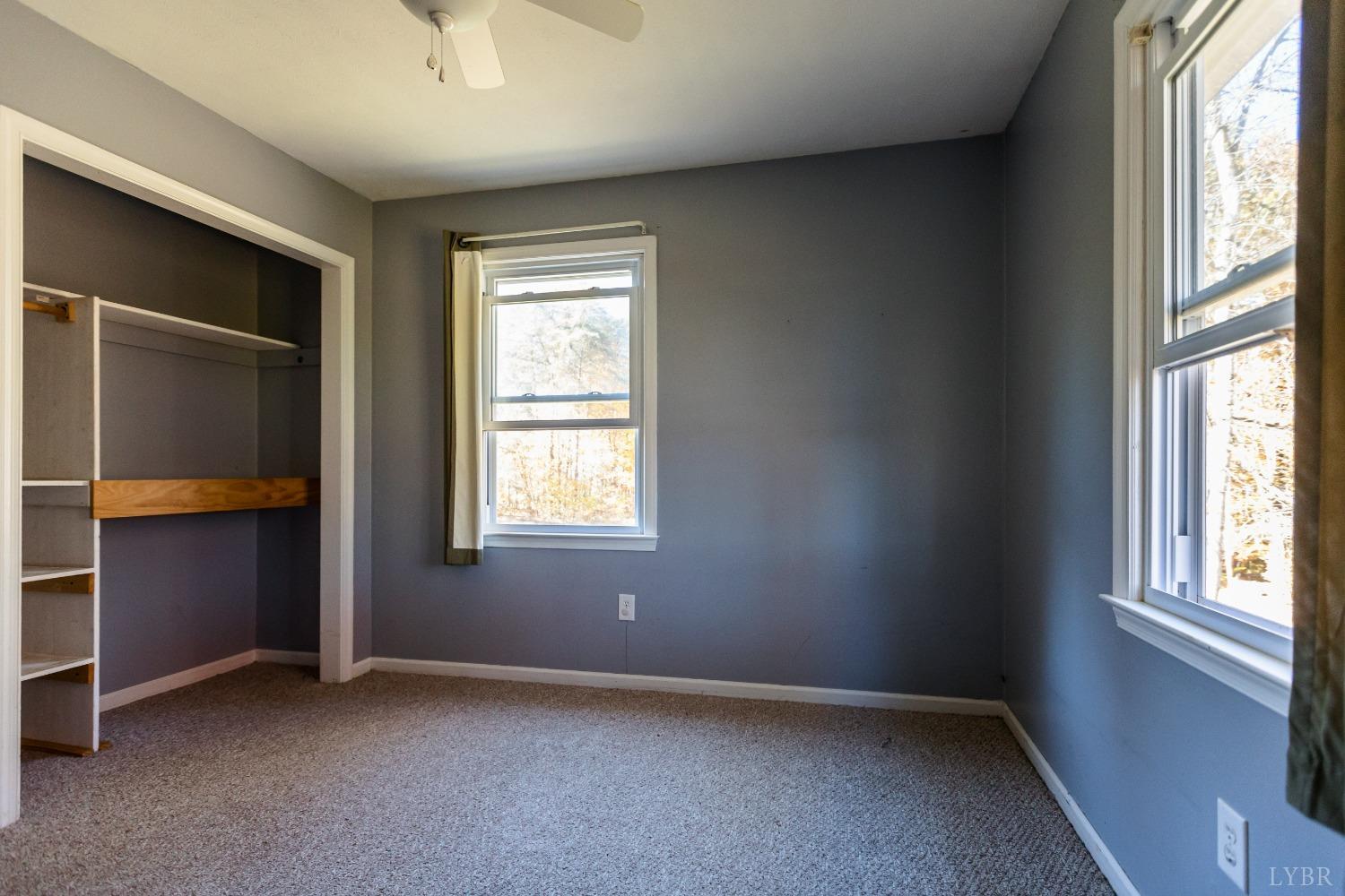 4945 Hixburg Road Pamplin, VA 23958 - Photo 14 of 27 an empty room with windows
