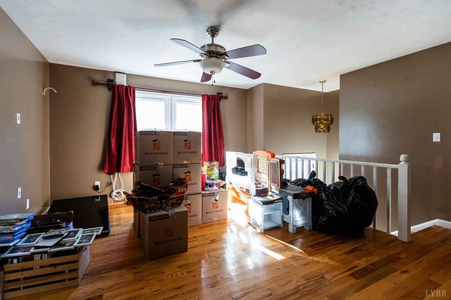 4945 Hixburg Road Pamplin, VA 23958 - Photo 4 of 27 a living room with furniture window and wooden floor