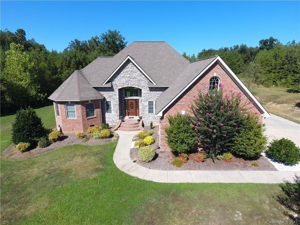 735 Faulkner Road Peachland, NC 28133 - Photo 3 of 24 a view of a house with a yard
