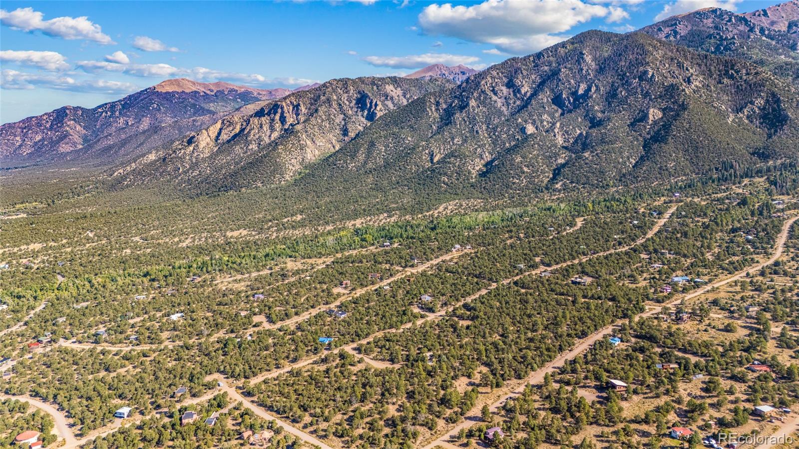 961 Ridgeview Way Crestone, CO 81131 - Photo 14 of 18 a view of a water pond with lots of trees