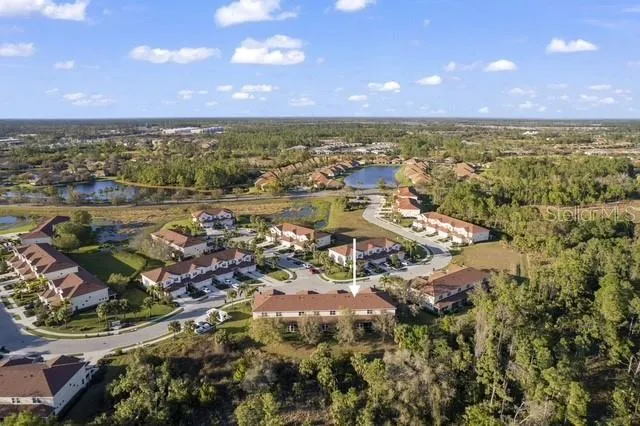 an aerial view of residential building with outdoor space