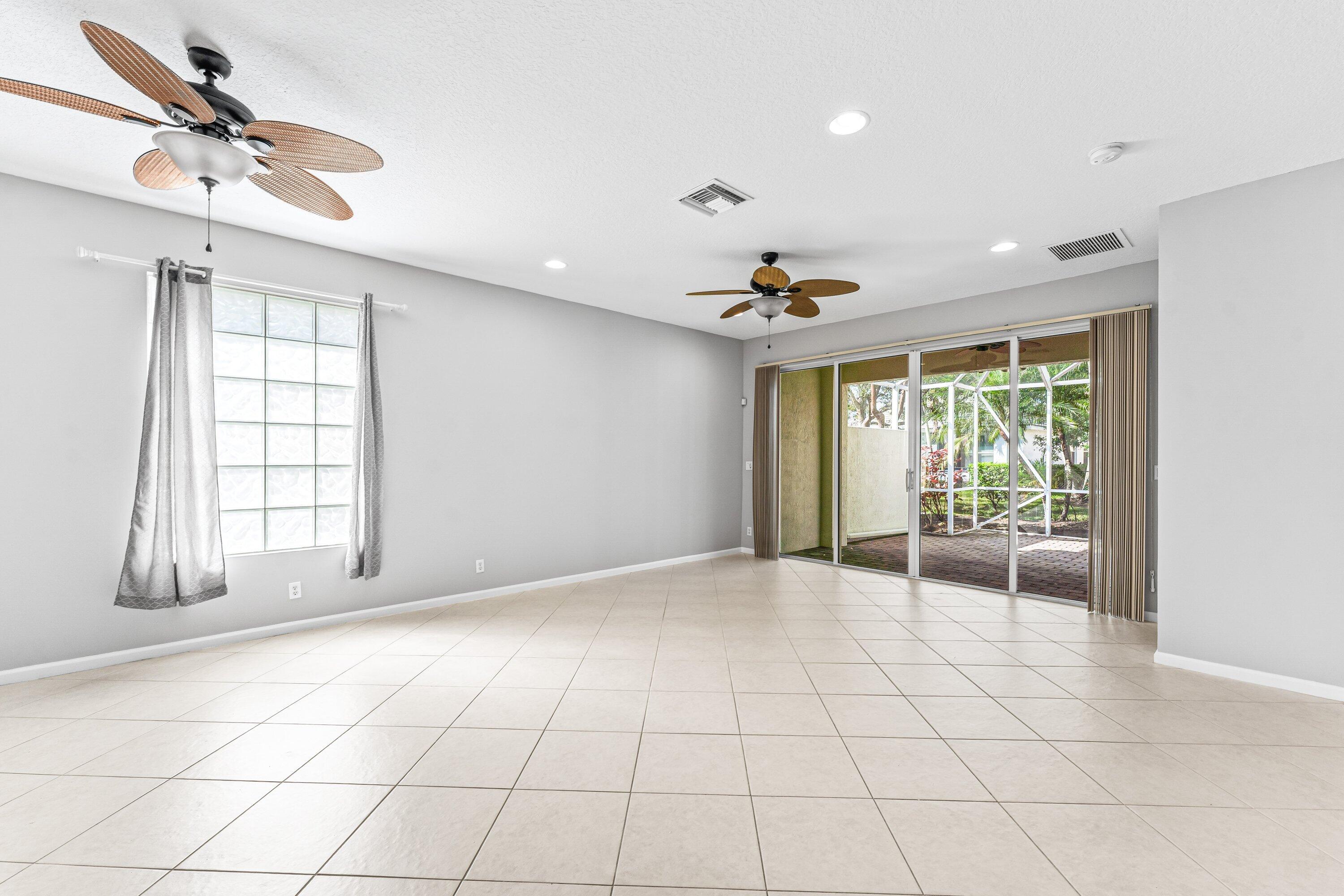 443 Belle Grove Lane West Palm Beach, FL 33411 - Photo 15 of 29 a view of an empty room with a window