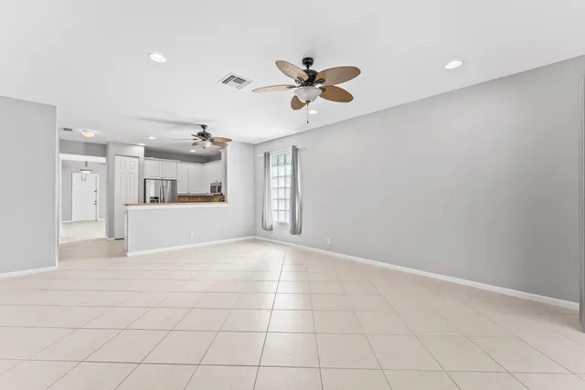 a view of entryway and kitchen