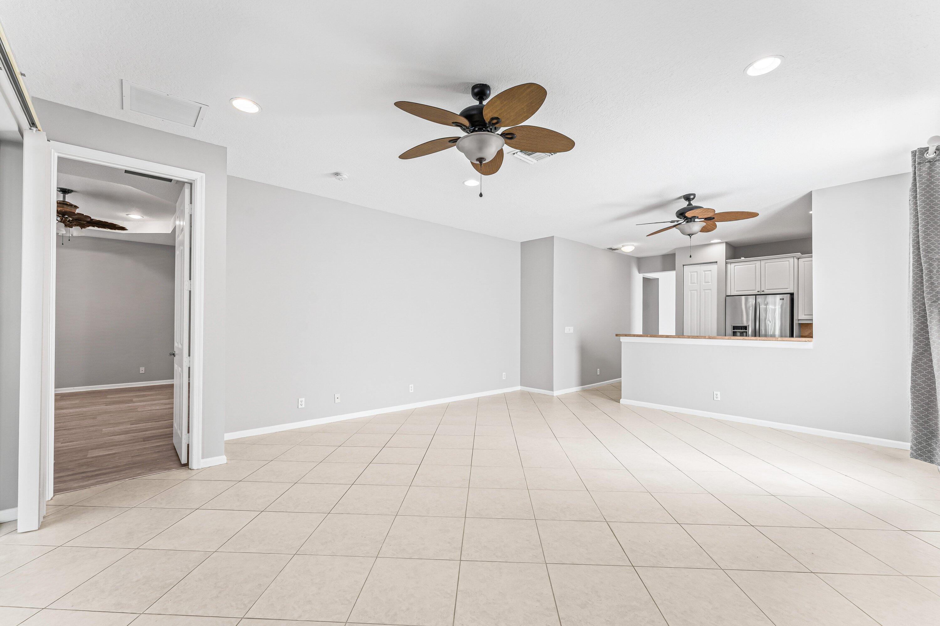 443 Belle Grove Lane West Palm Beach, FL 33411 - Photo 17 of 29 a view of entryway and kitchen