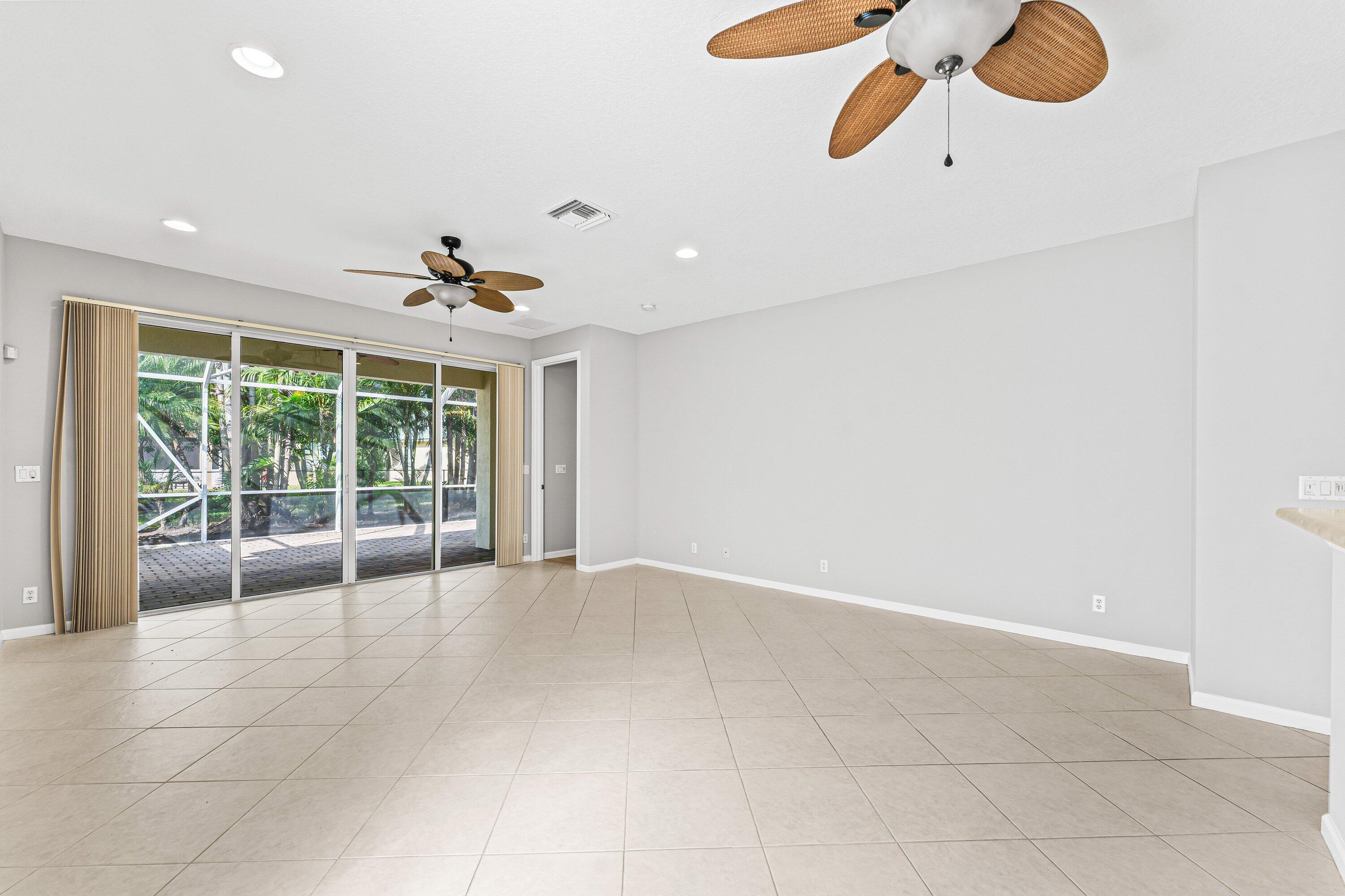 443 Belle Grove Lane West Palm Beach, FL 33411 - Photo 18 of 29 a view of an empty room with a window