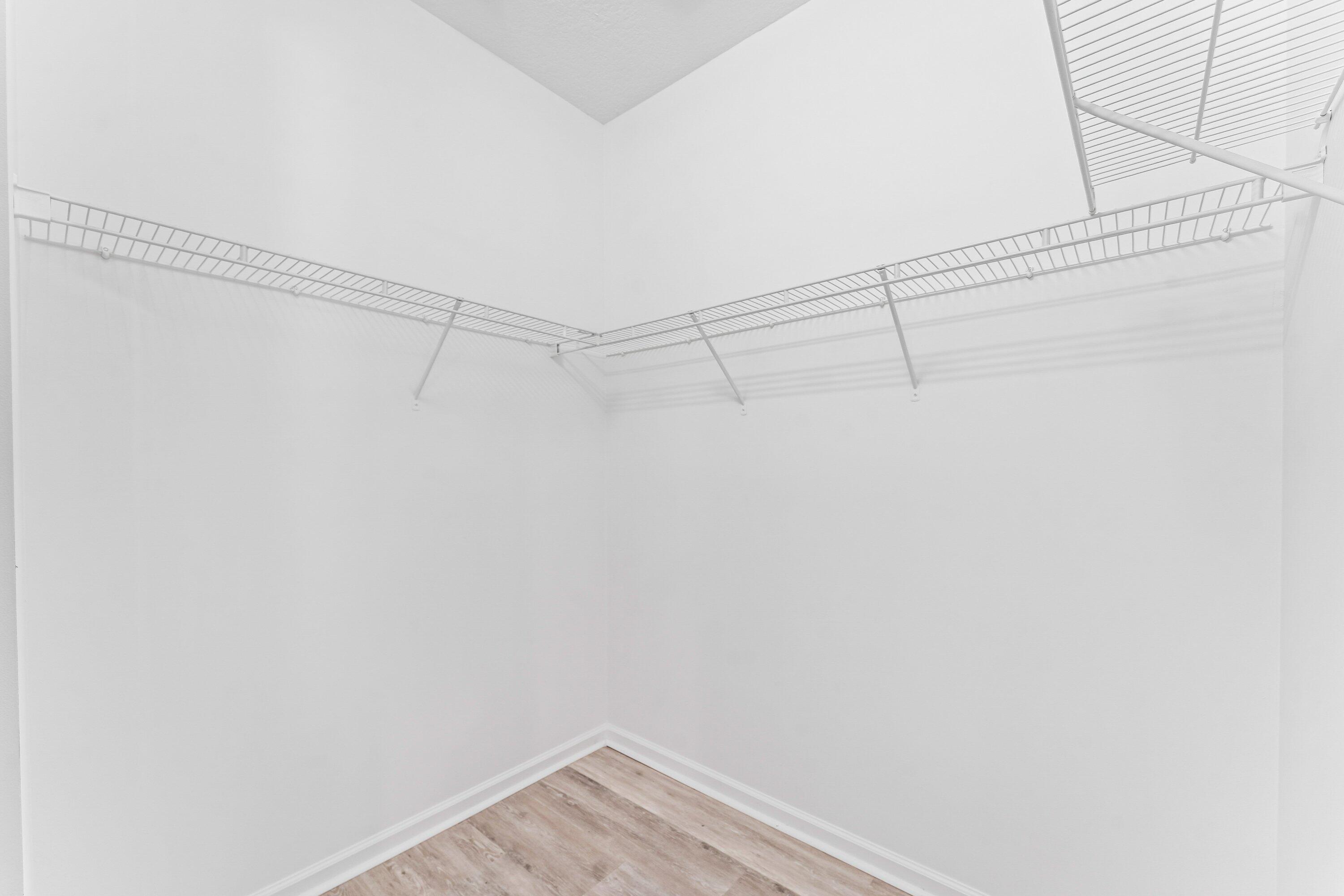 443 Belle Grove Lane West Palm Beach, FL 33411 - Photo 22 of 29 a view of a room with racks on the wall