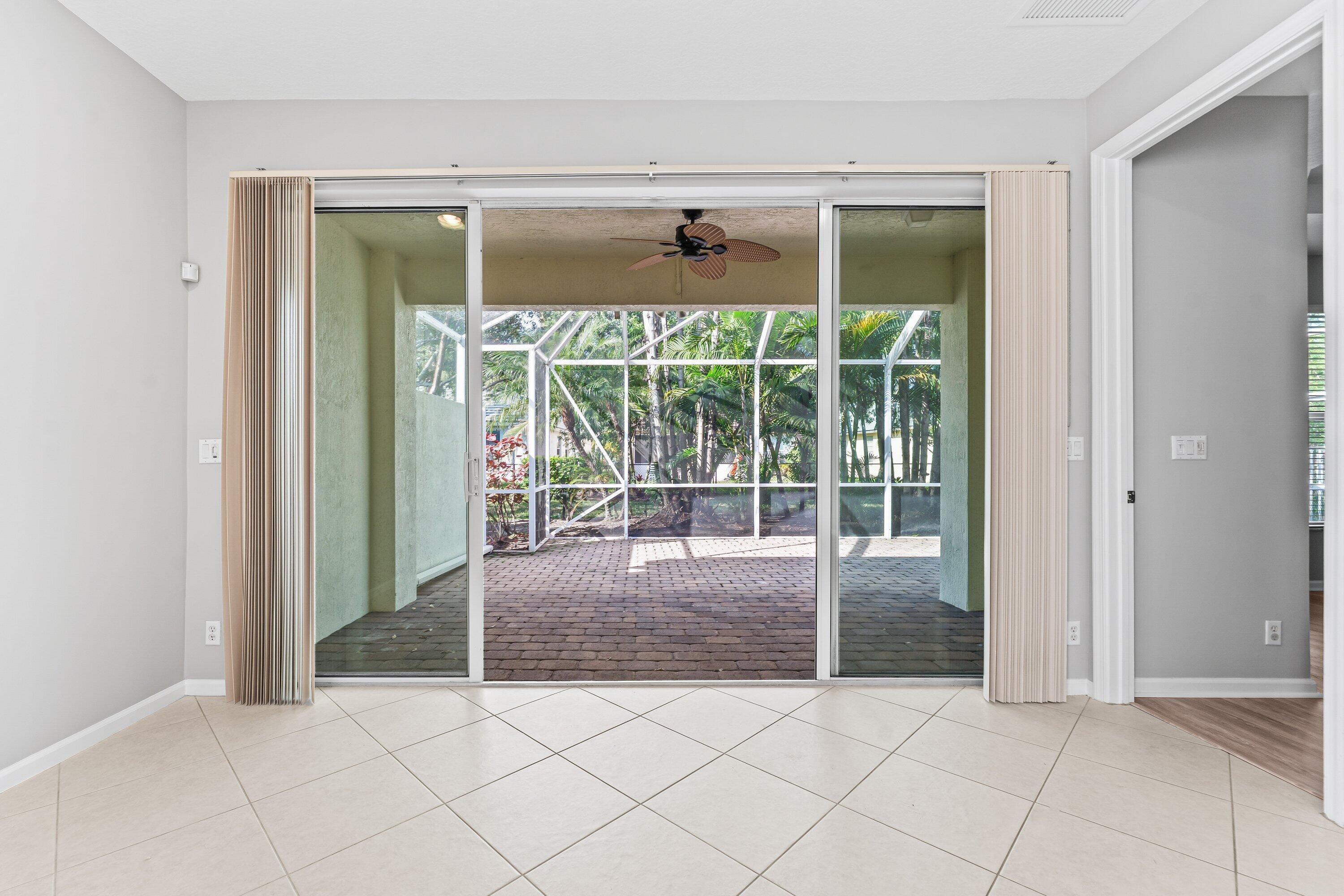 443 Belle Grove Lane West Palm Beach, FL 33411 - Photo 25 of 29 a entryway view with glass door