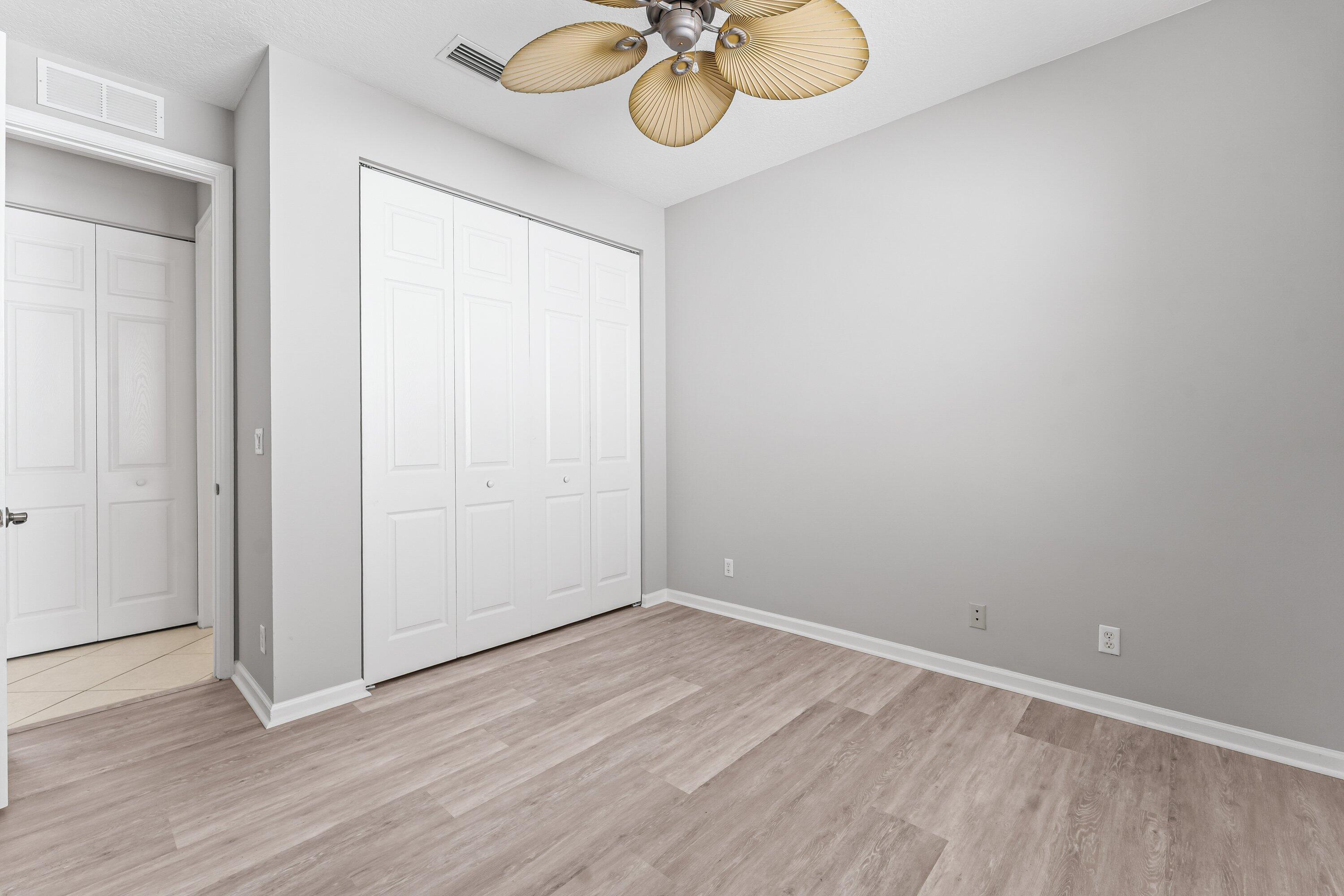 443 Belle Grove Lane West Palm Beach, FL 33411 - Photo 9 of 29 a view of a room with wooden floor