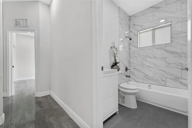 a couple of palm trees in front of door