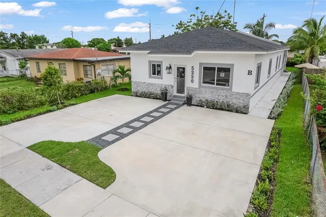 a view of outdoor space yard and front view of a house