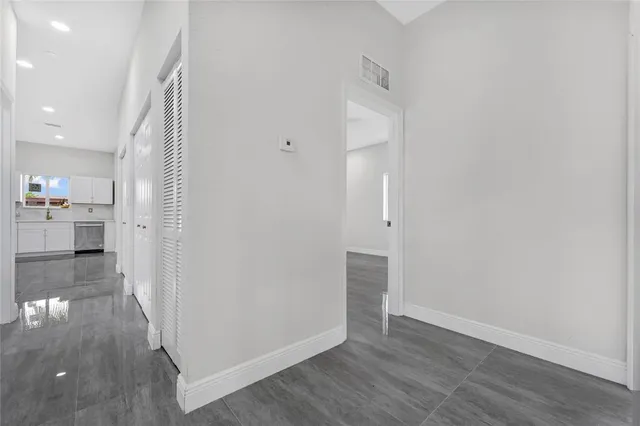 a bathroom with a sink a toilet and bathtub