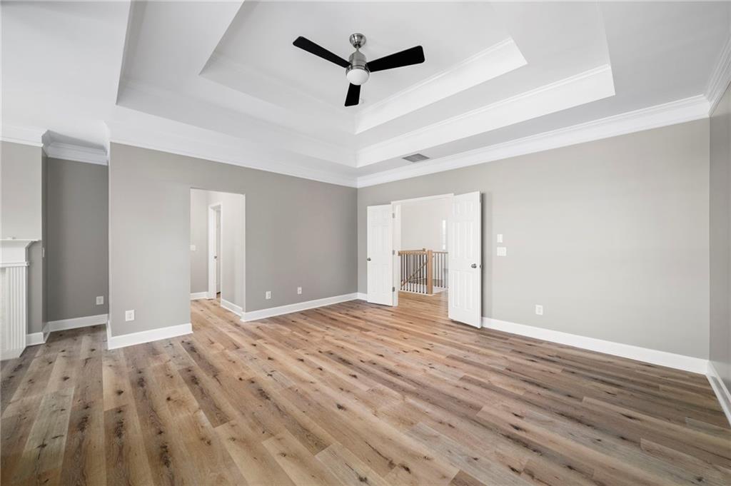 3628 Ashcroft Bend Atlanta, GA 30319 - Photo 25 of 44 a view of empty room with wooden floor