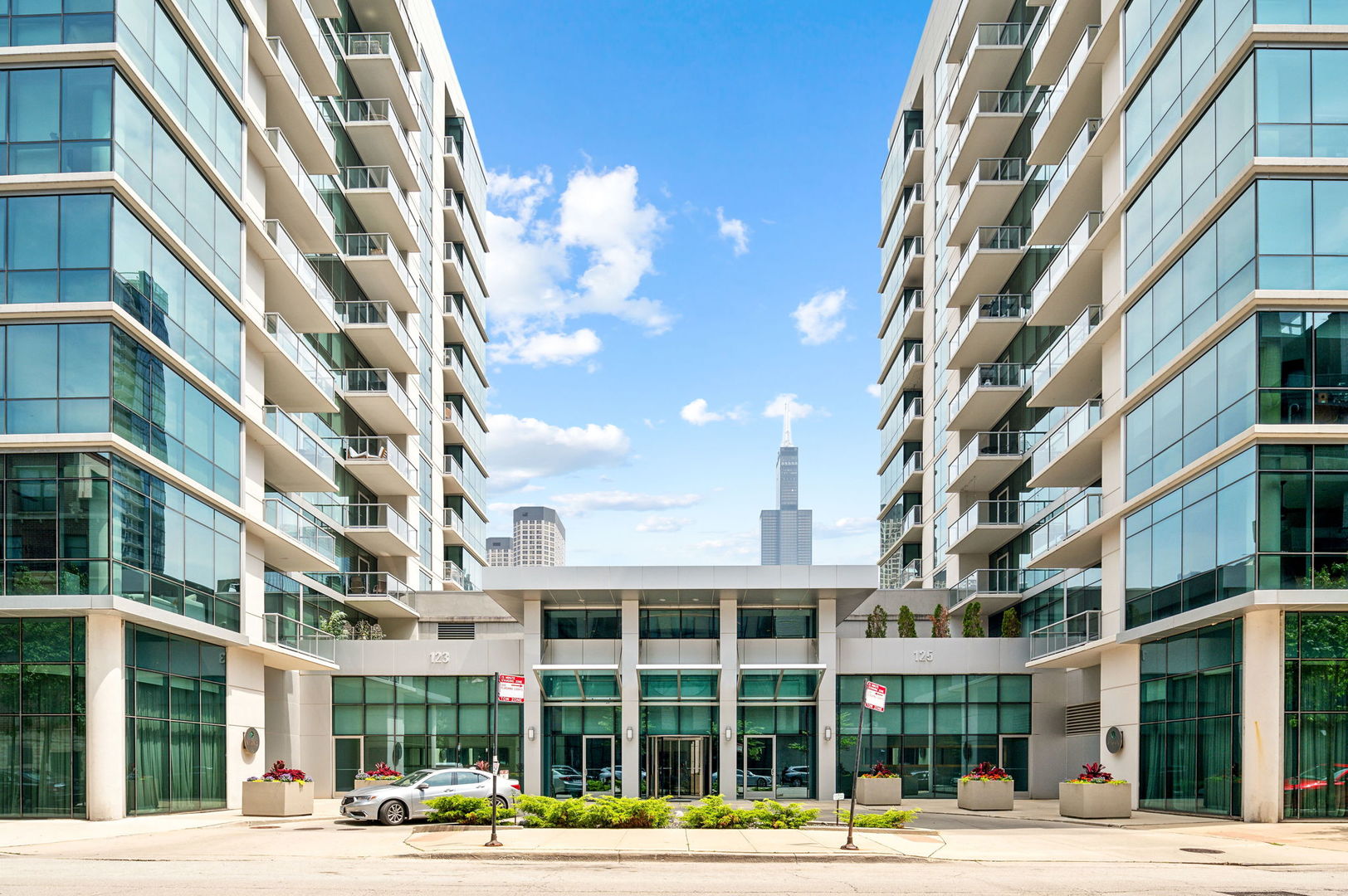 123 South Green Street, Unit 407B Chicago, IL 60607 - Photo 1 of 20 a view of a building and a street