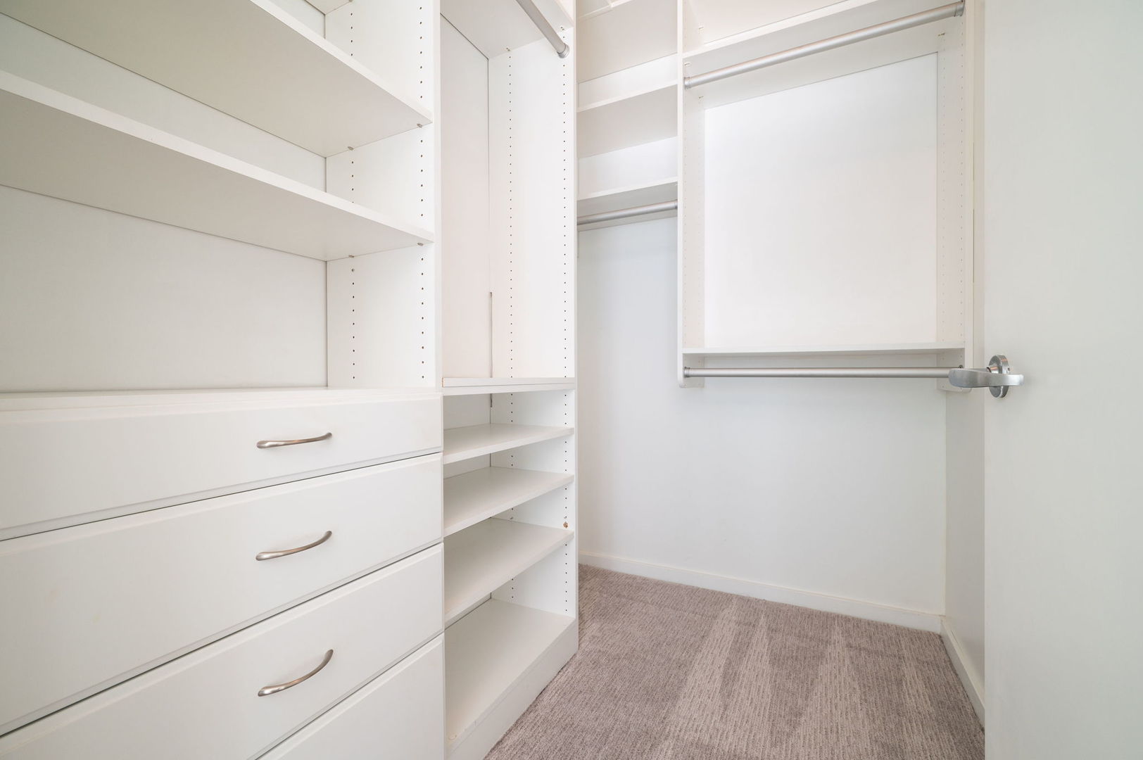 123 South Green Street, Unit 407B Chicago, IL 60607 - Photo 12 of 20 a view of walk in closet with empty racks
