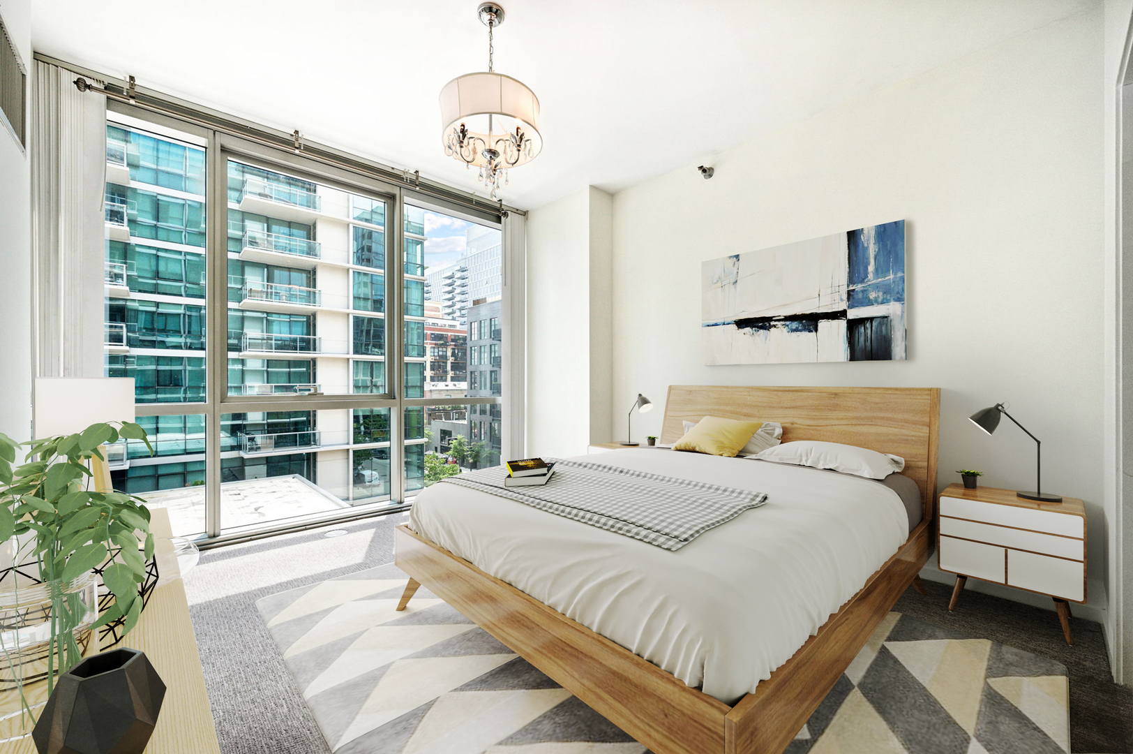 123 South Green Street, Unit 407B Chicago, IL 60607 - Photo 4 of 20 a bedroom with a large bed and a chandelier