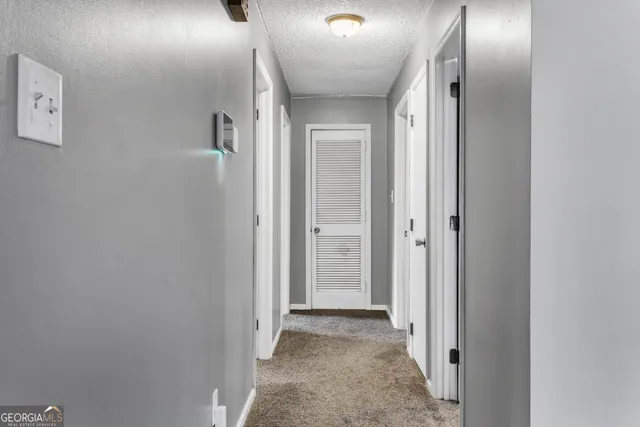 an empty room with wooden floor