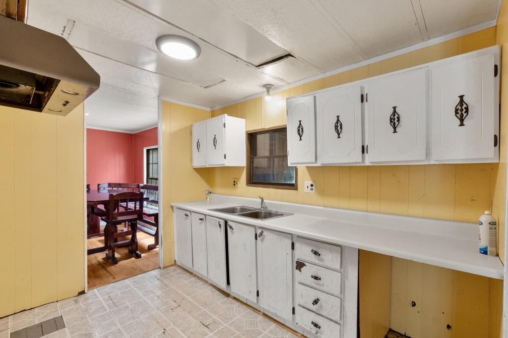 9503 Tails Creek Road Ellijay, GA 30540 - Photo 11 of 30 a kitchen with stainless steel appliances a stove and a refrigerator