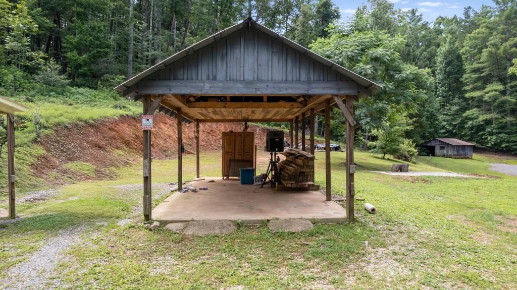 9503 Tails Creek Road Ellijay, GA 30540 - Photo 26 of 30 a view of a house with backyard