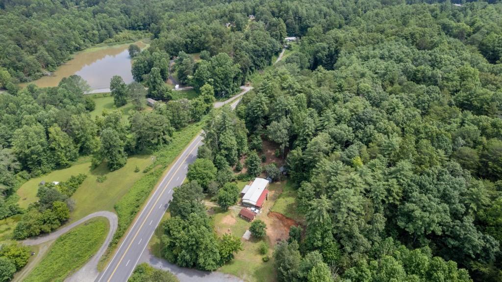 9503 Tails Creek Road Ellijay, GA 30540 - Photo 30 of 30 an aerial view of a house with a yard and outdoor seating