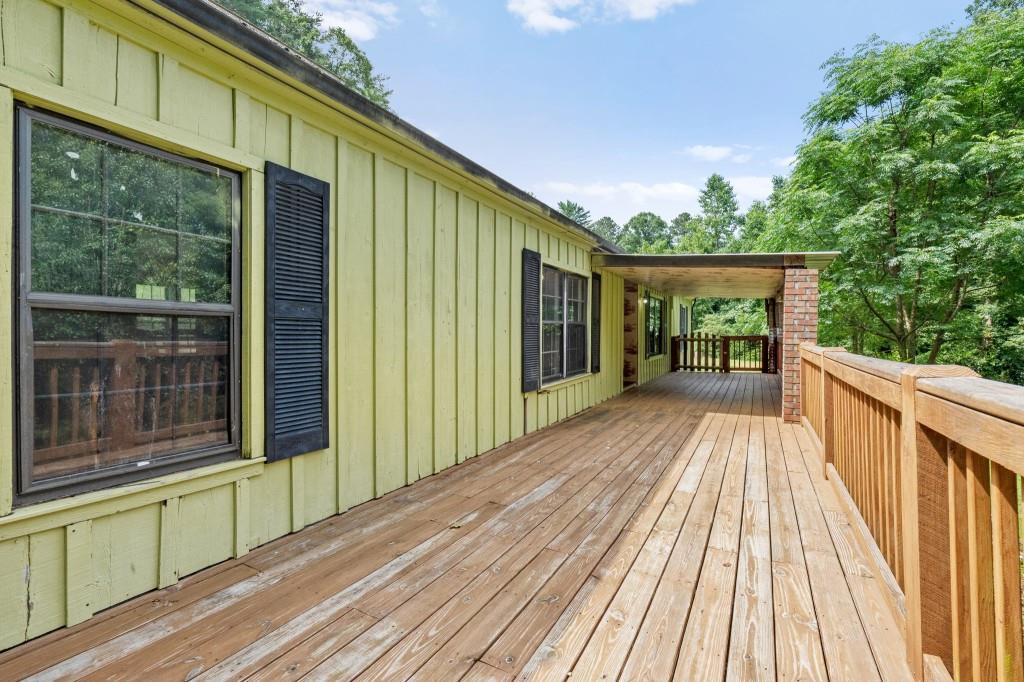 9503 Tails Creek Road Ellijay, GA 30540 - Photo 4 of 30 a view of backyard with a deck and wooden floor