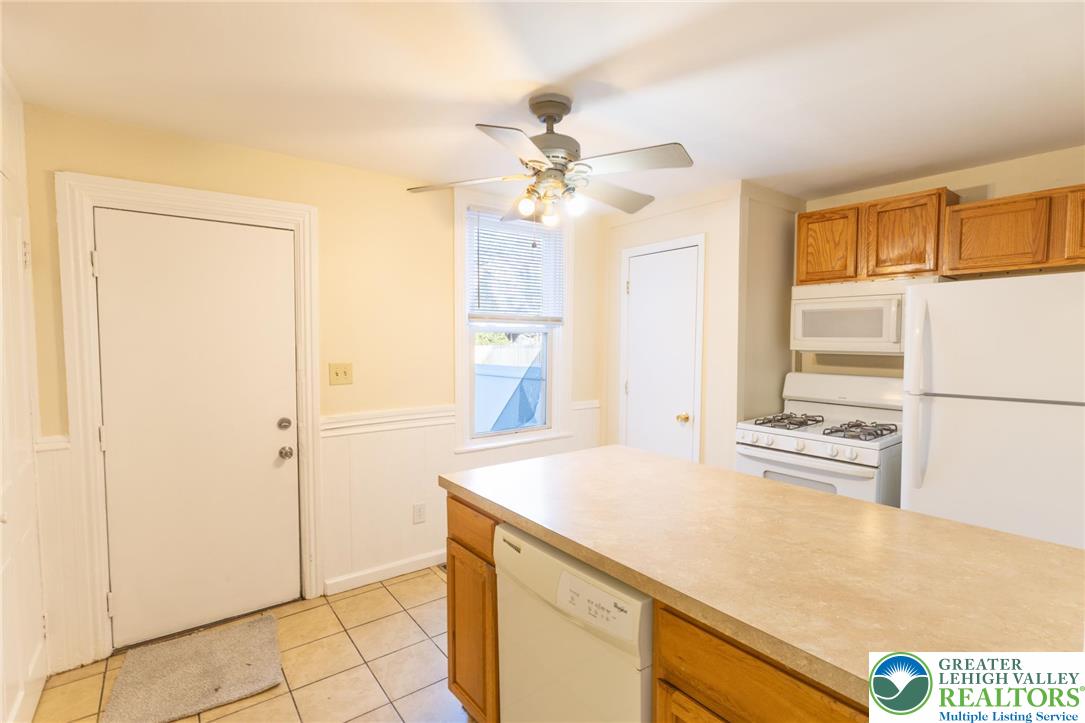 32 West Raspberry Street Bethlehem, PA 18018 - Photo 8 of 17 a kitchen with stainless steel appliances a refrigerator and a stove