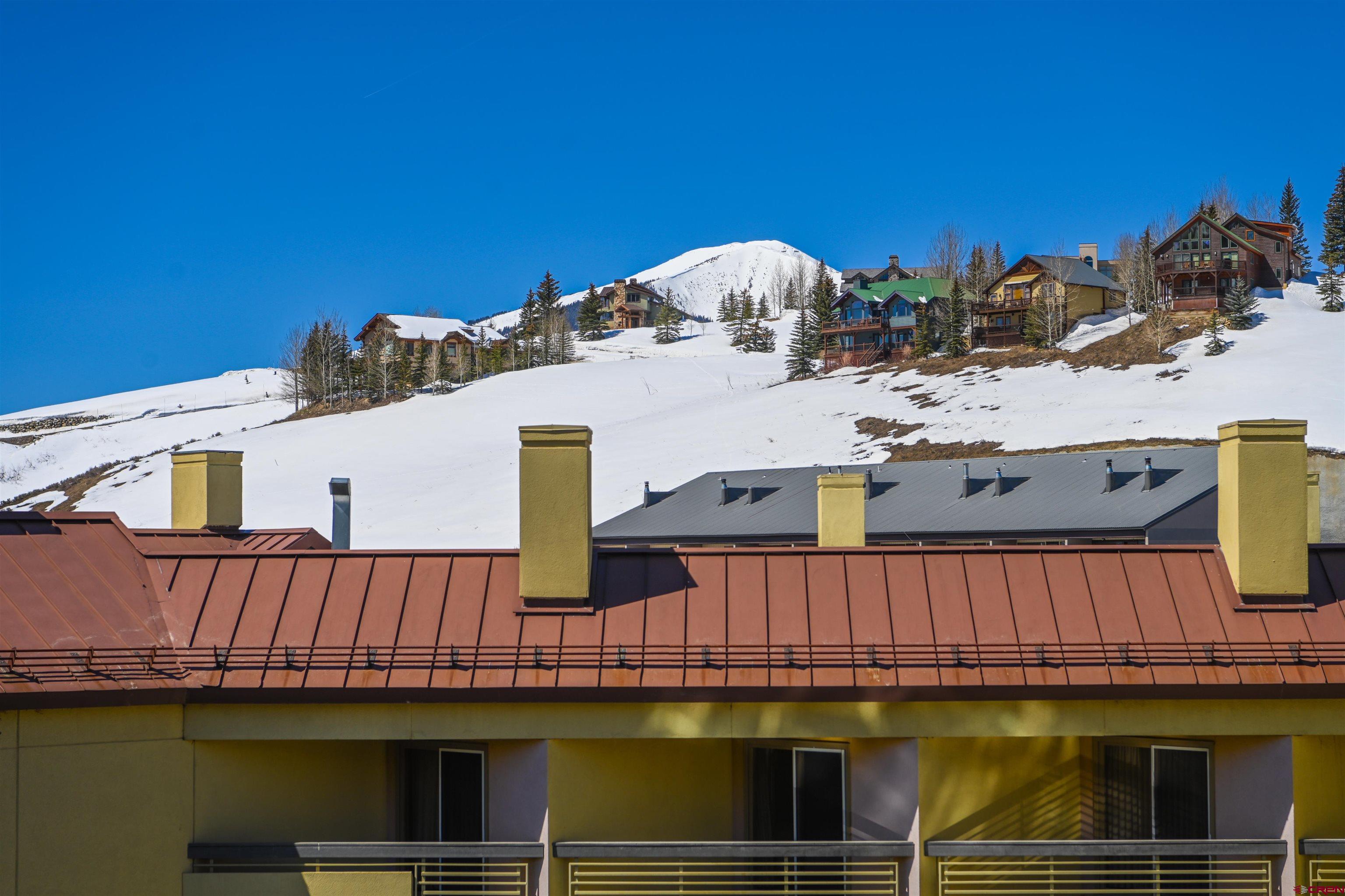500 Gothic Road, Unit 333 Crested Butte, CO 81225 - Photo 17 of 21 a view of a house with roof deck