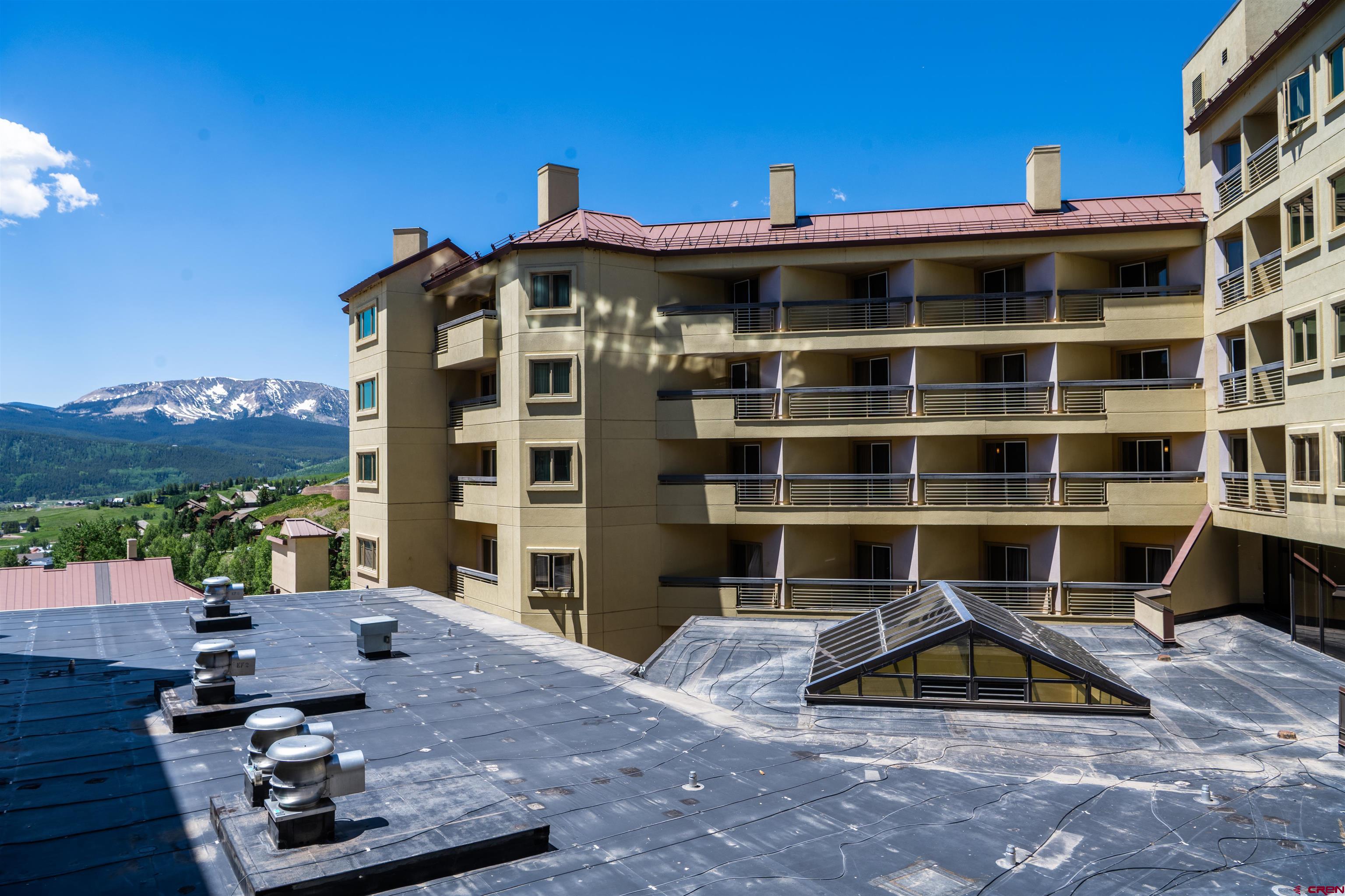 500 Gothic Road, Unit 333 Crested Butte, CO 81225 - Photo 20 of 21 a view of a building with a porch