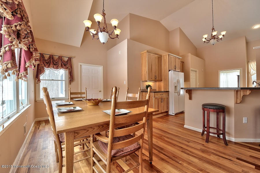 33 Larrison Road Wrightstown, NJ 08562 - Photo 12 of 35 a view of a dining room with furniture and a chandelier
